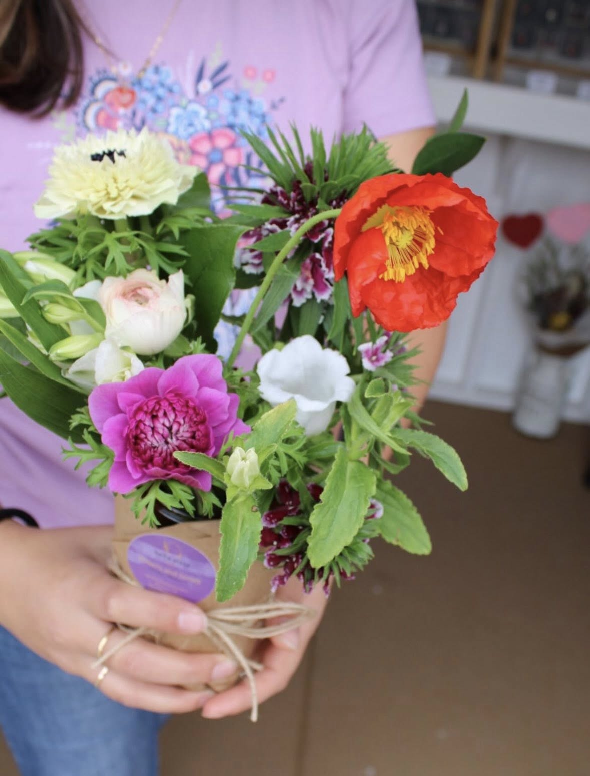 Seasonal farm-grown bouquet styled in a vase as part of a flower subscription