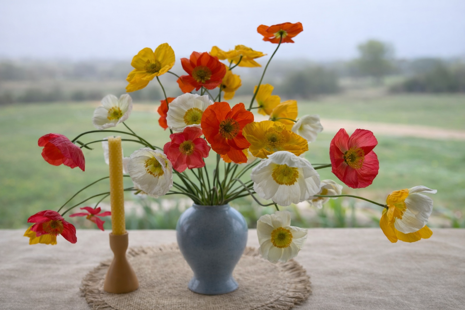 Dinner table with fresh poppies from Bella Vista Flower Farm in Brenham Texas