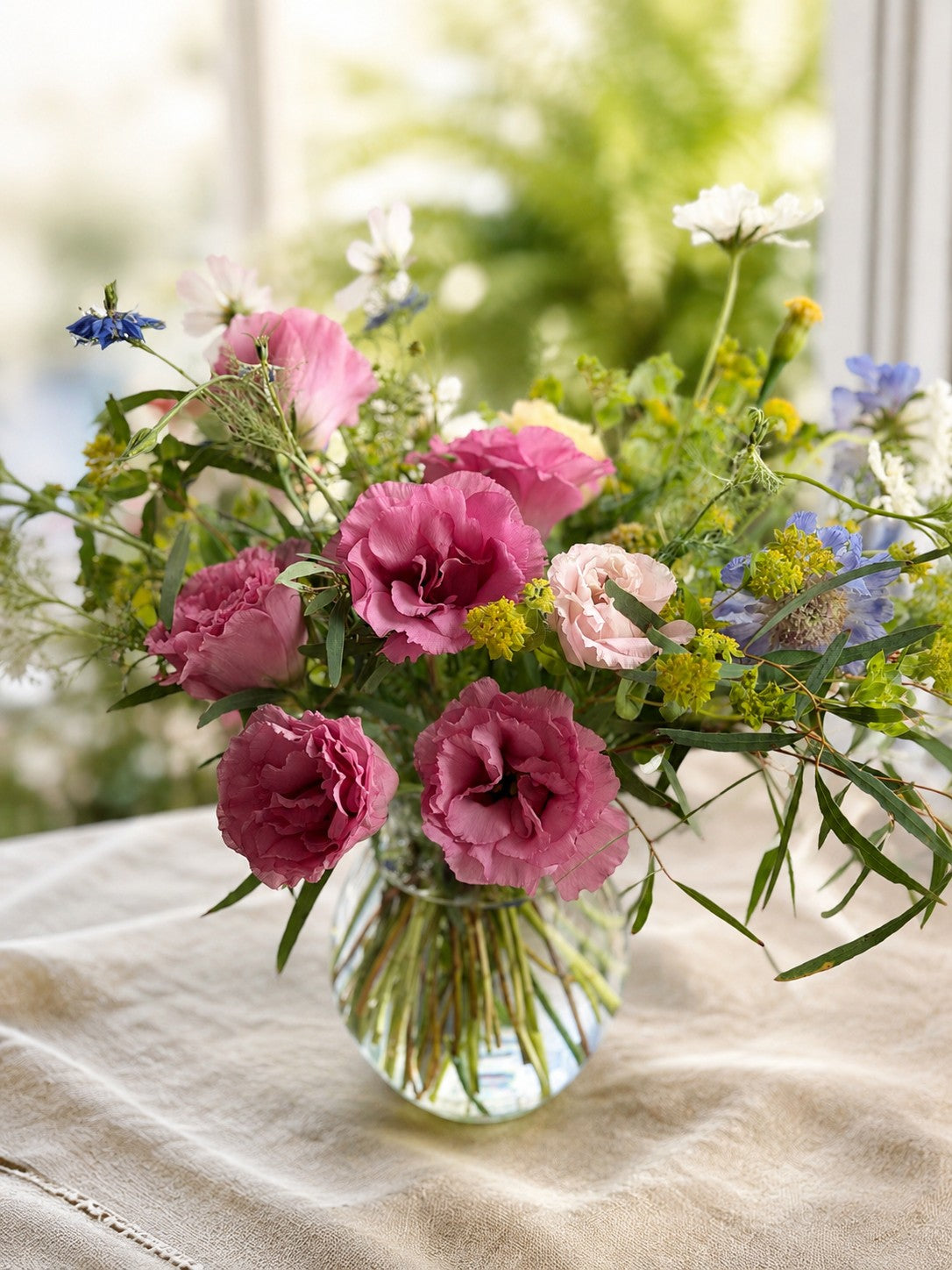 Texas-grown lisianthus and seasonal flowers arranged for a summer gathering in Brenham Texas