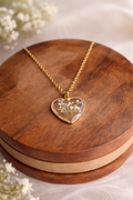 Pressed flower necklace featuring a real flower preserved in resin